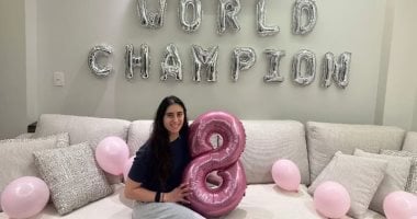 احتفال نور الشربينى وزوجها بعد الفوز ببطولة العالم للاسكواش